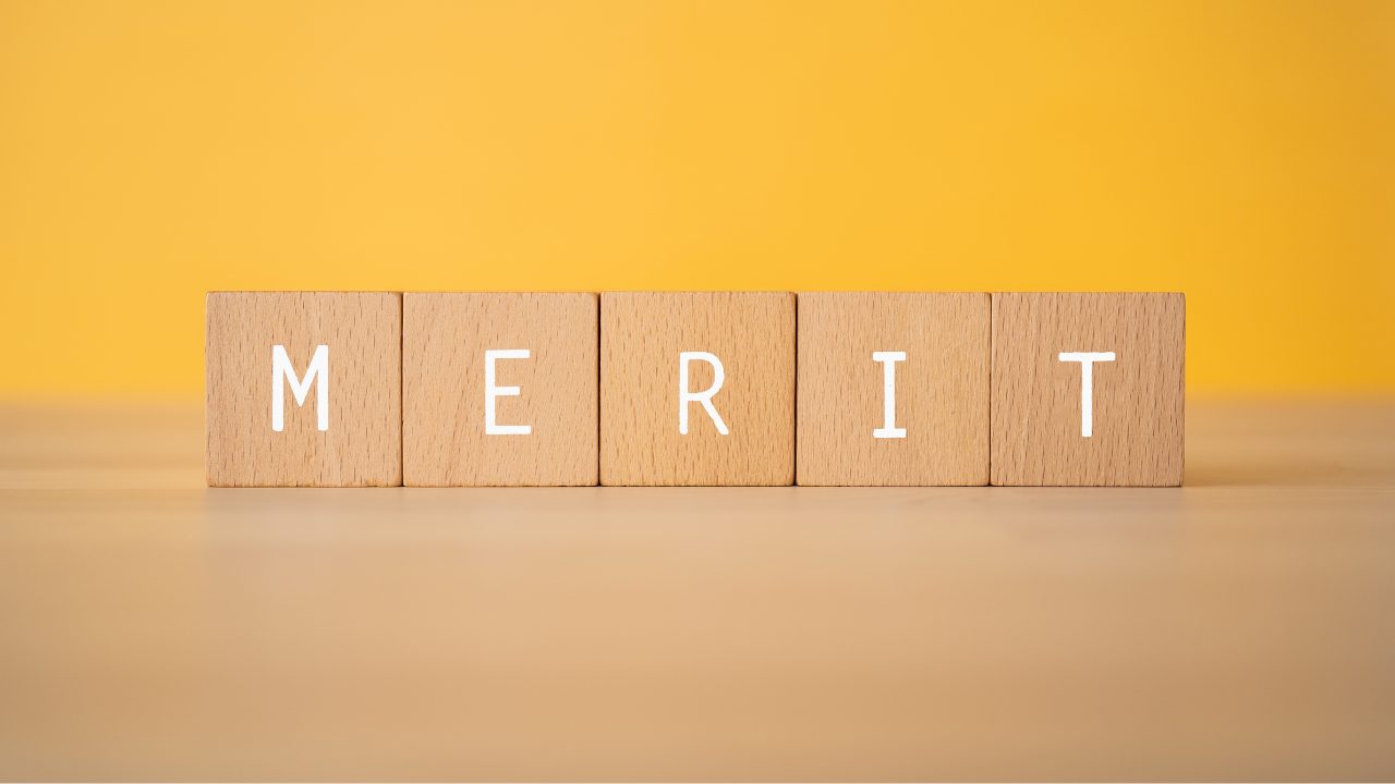 meritと書かれたブロック
